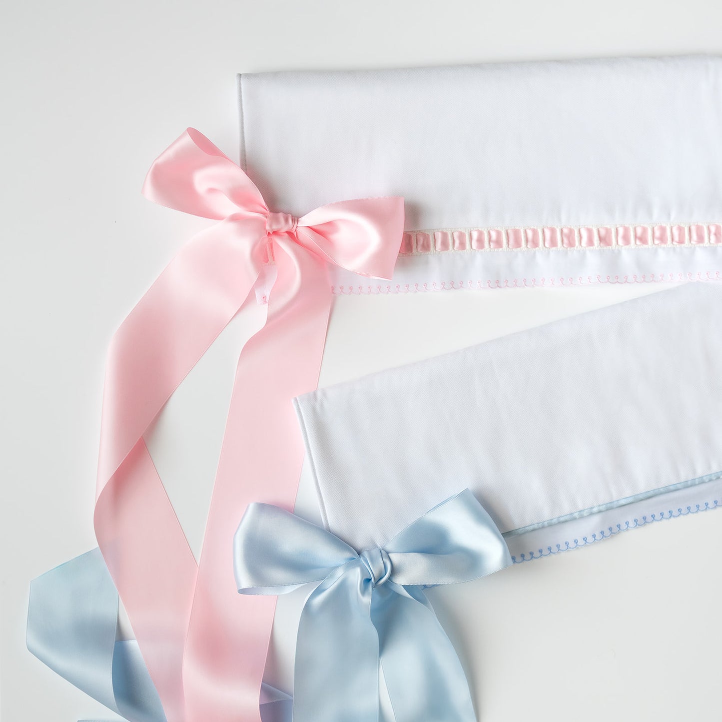 White Pique Crib Rail Topper with Pink Ribbon