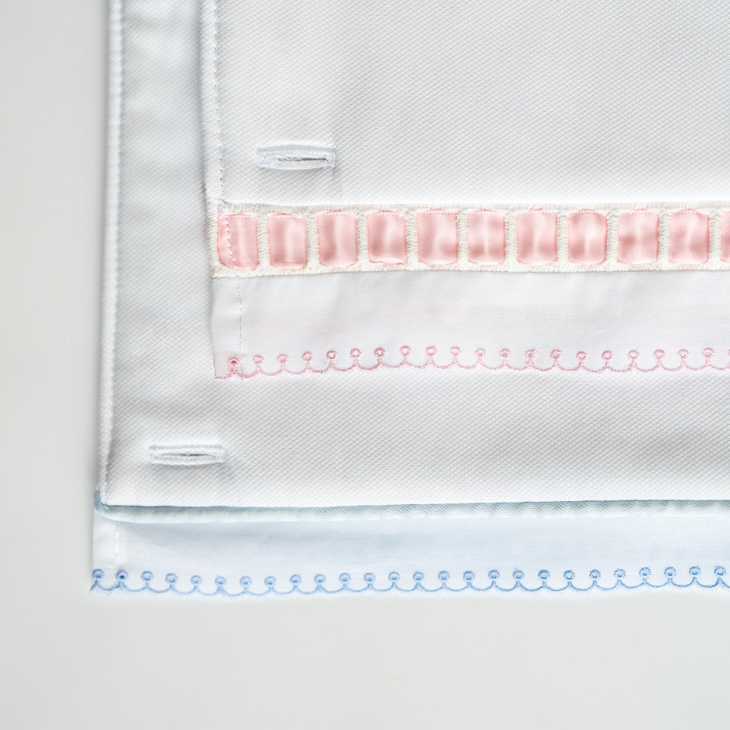 White Pique Crib Rail Topper with Blue Ribbon