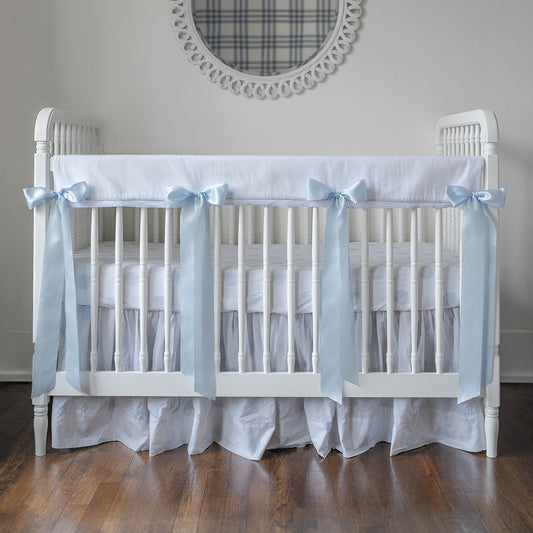 White Pique Crib Rail Topper with Blue Ribbon